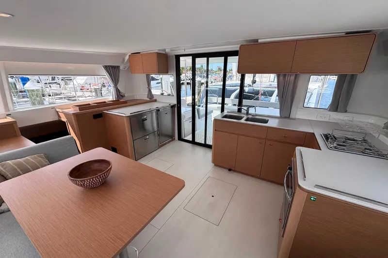 Slide: The Image of Modern interior of 2026 Excess 14 yacht with kitchen and dining area. - 49
