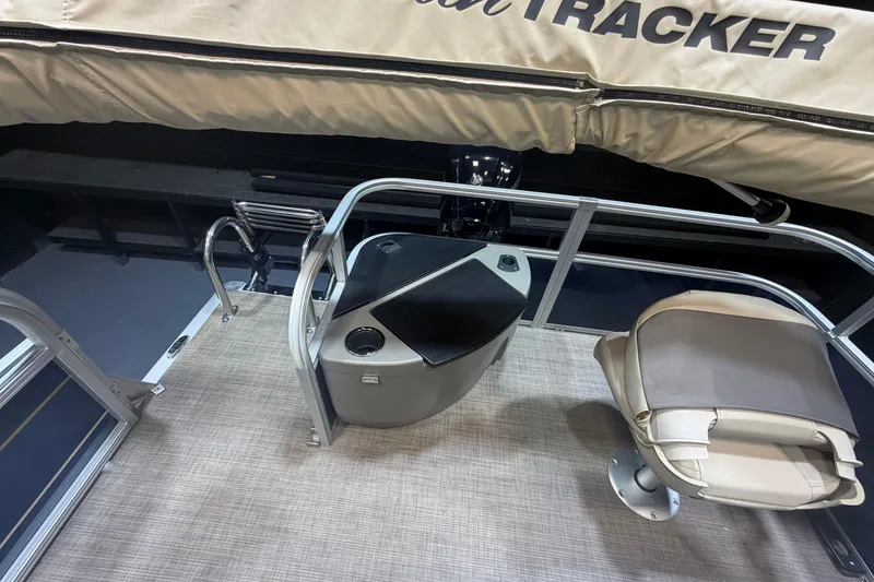 The Image of 2023 Sun Tracker Bass Buggy 18 DLX boat interior with seating and storage features. - 11