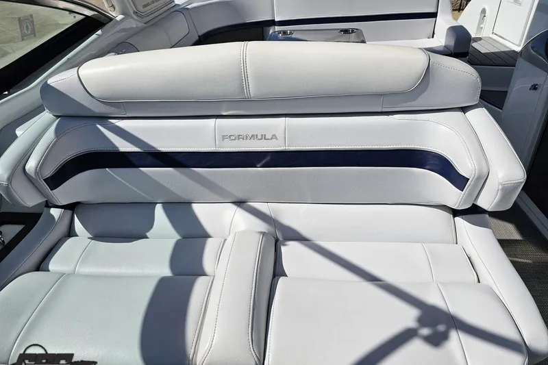 Slide: The Image of 2015 Formula 350 Sun Sport boat interior with white leather seating. - 111