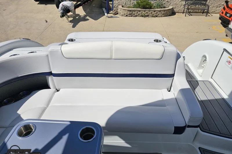Slide: The Image of 2015 Formula 350 Sun Sport boat interior with white seating and cup holders. - 114