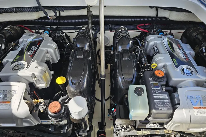 Slide: The Image of Twin engines of a 2015 Formula 350 Sun Sport boat, showcasing powerful performance. - 120