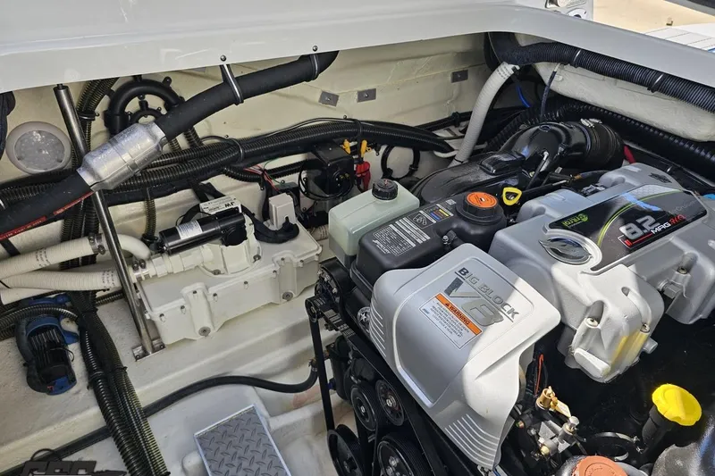 Slide: The Image of Engine compartment of a 2015 Formula 350 Sun Sport boat, featuring a powerful V8 engine. - 121