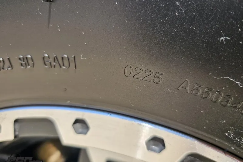 Slide: The Image of Close-up of tire markings on a 2015 Formula 350 Sun Sport. - 123