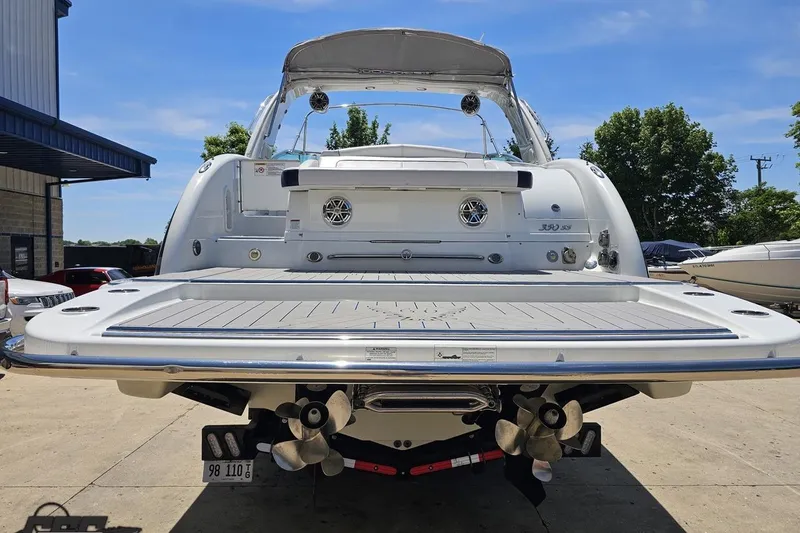 Slide: The Image of 2015 Formula 350 Sun Sport boat rear view with swim platform and dual propellers. - 28