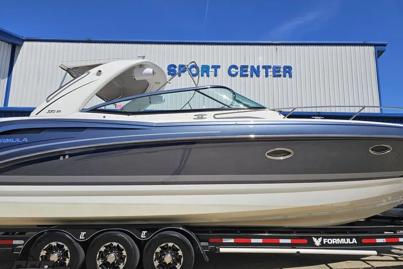 Slide: The Image of 2015 Formula 350 Sun Sport boat on trailer at sport center. - 3