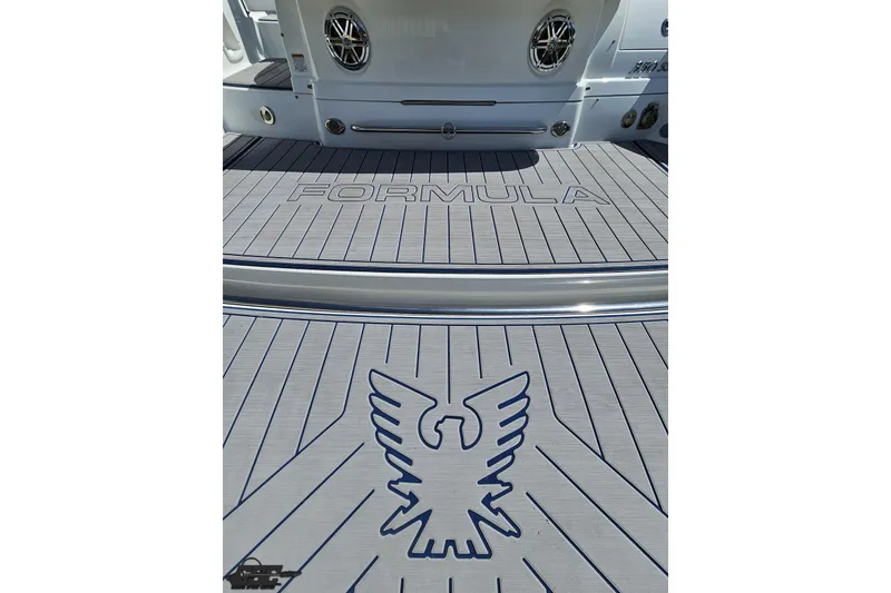 Slide: The Image of 2015 Formula 350 Sun Sport boat deck with logo and branding details. - 33