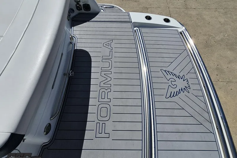 Slide: The Image of 2015 Formula 350 Sun Sport boat deck with logo and sleek design. - 38