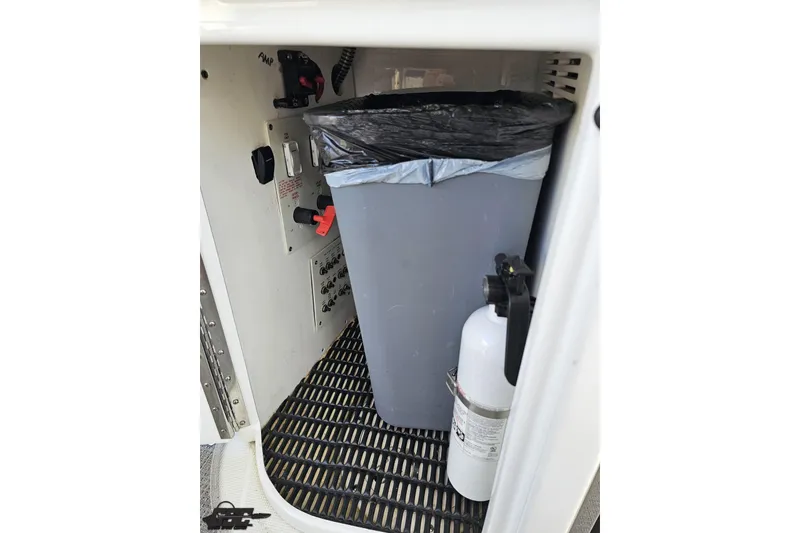 Slide: The Image of Interior of 2015 Formula 350 Sun Sport with trash bin and fire extinguisher. - 54