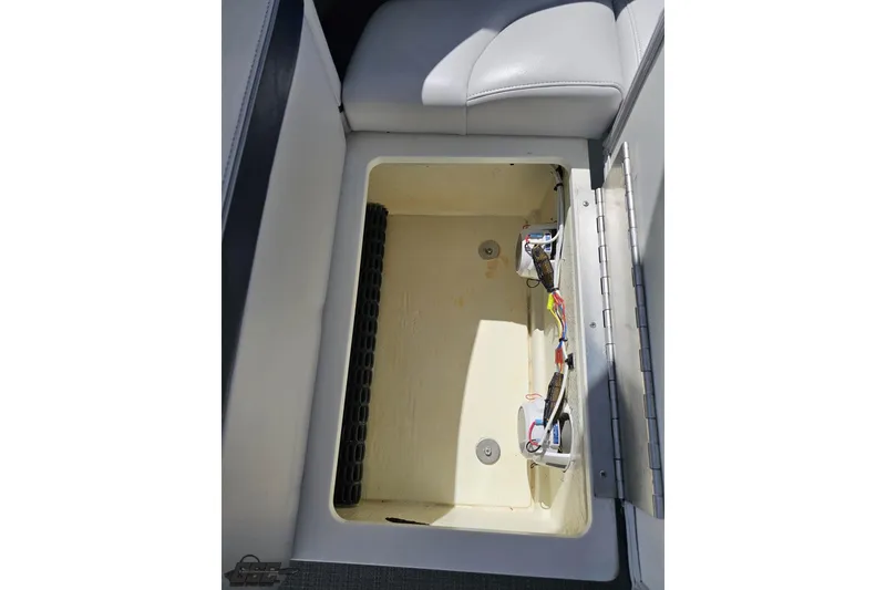 Slide: The Image of Storage compartment in a 2015 Formula 350 Sun Sport boat, featuring wiring and seating. - 59
