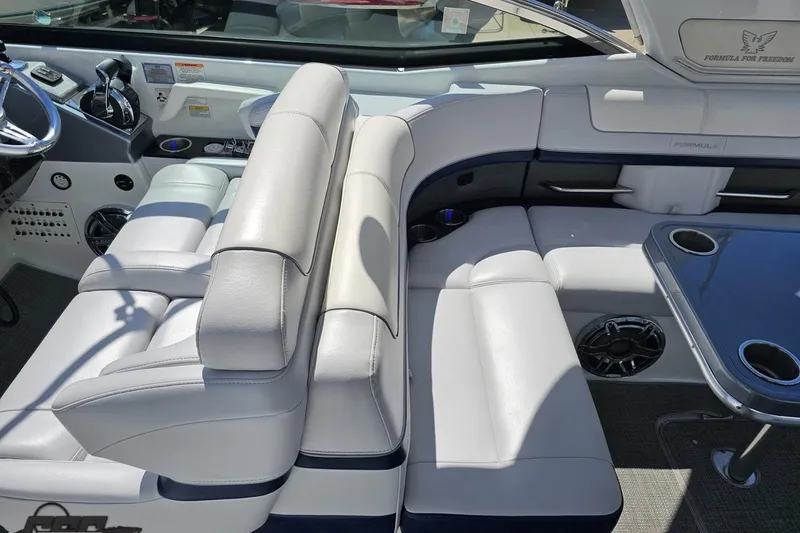 Slide: The Image of Luxurious interior of a 2015 Formula 350 Sun Sport boat with plush seating and sleek design. - 64
