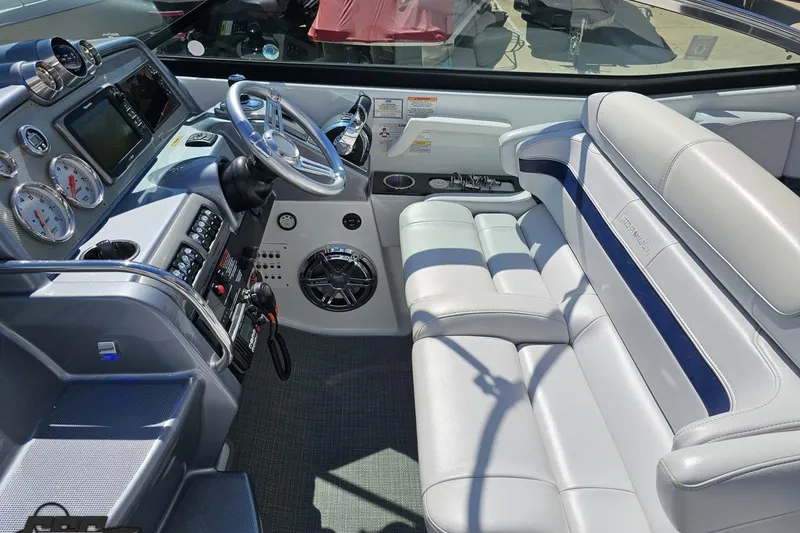 Slide: The Image of 2015 Formula 350 Sun Sport boat interior with modern dashboard and plush seating. - 65