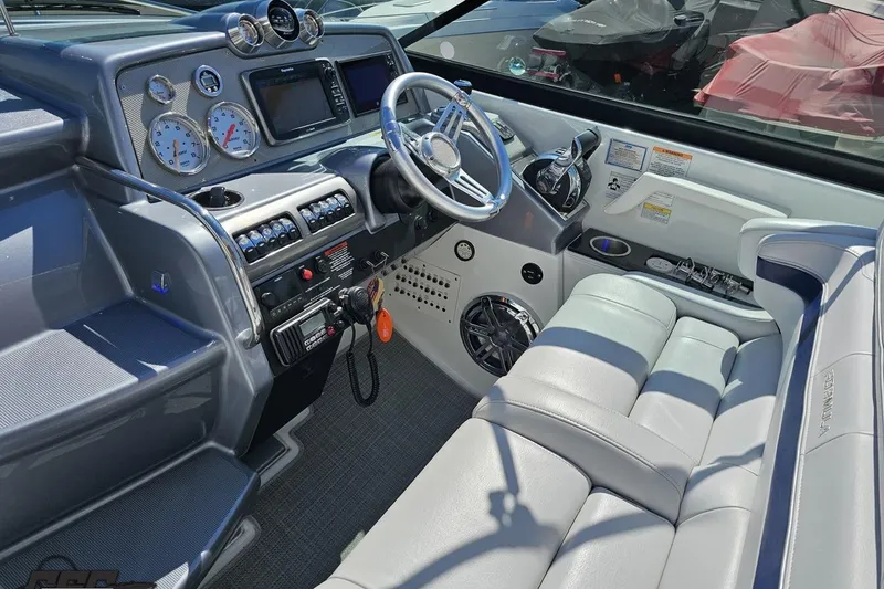 Slide: The Image of Cockpit of 2015 Formula 350 Sun Sport boat with modern controls and leather seating. - 68