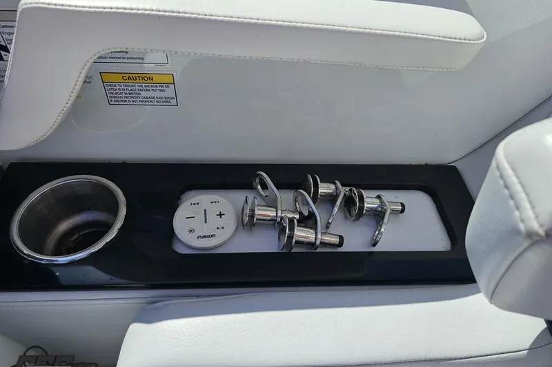 Slide: The Image of Interior of 2015 Formula 350 Sun Sport with cup holder and audio controls. - 73