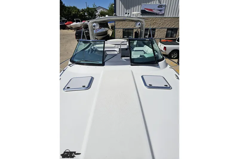 Slide: The Image of 2015 Formula 350 Sun Sport boat with sleek design and spacious deck in marina setting. - 78