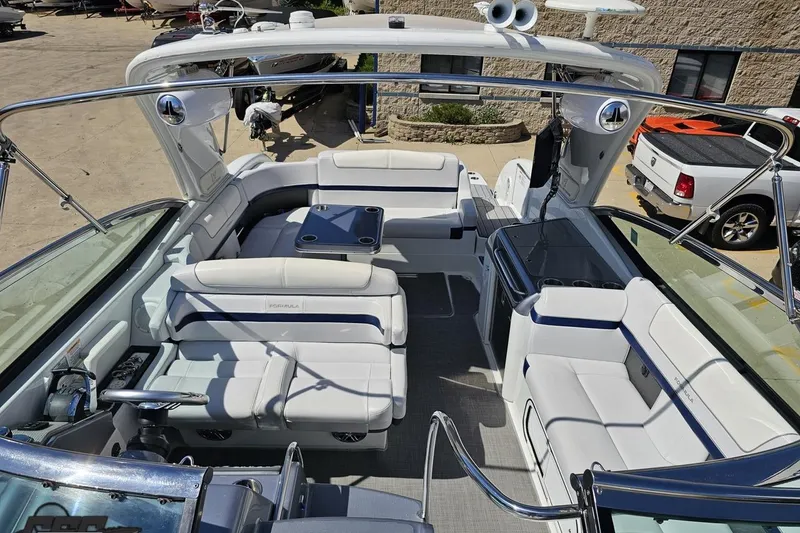 Slide: The Image of 2015 Formula 350 Sun Sport boat interior with white seating and sleek design. - 80