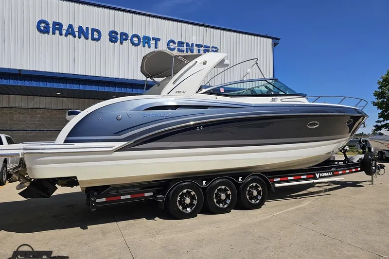 Slide: The Image of 2015 Formula 350 Sun Sport boat on trailer at Grand Sport Center. - 9