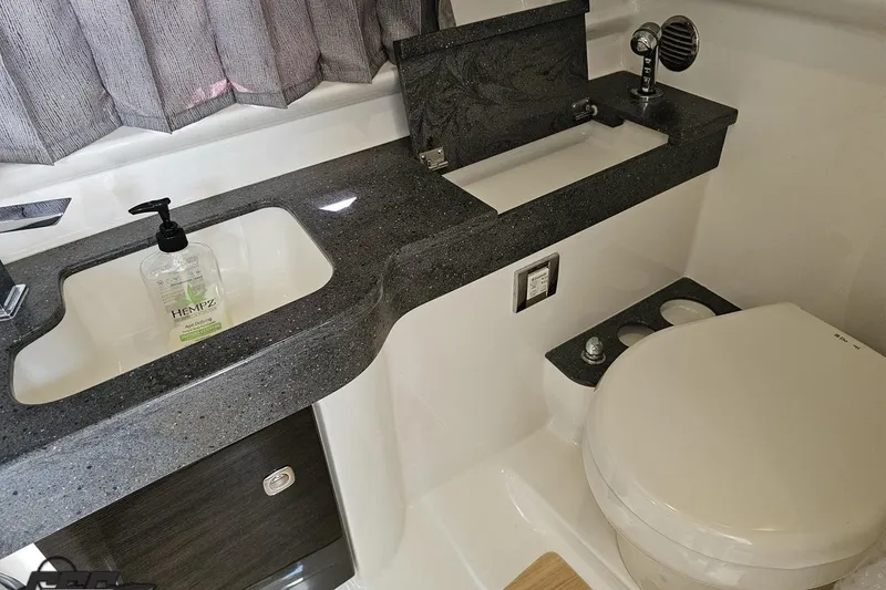 Slide: The Image of 2015 Formula 350 Sun Sport bathroom with modern sink and toilet. - 96