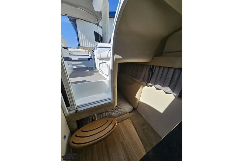 Slide: The Image of Interior view of 2015 Formula 350 Sun Sport boat cabin with seating and open hatch. - 99