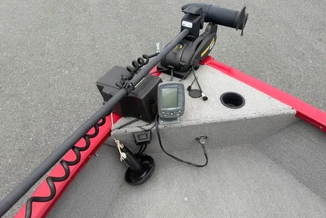 Slide: The Image of 2011 Tracker Pro Guide V-175 SC boat with trolling motor and fish finder on deck. - 16