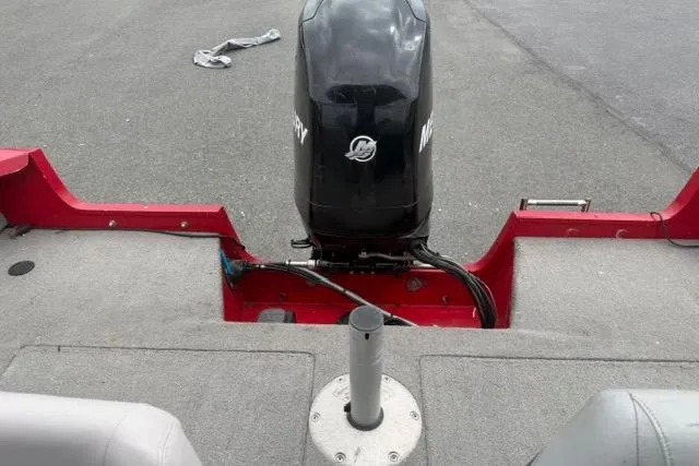 Slide: The Image of 2011 Tracker Pro Guide V-175 SC boat with Mercury outboard motor, rear view. - 8