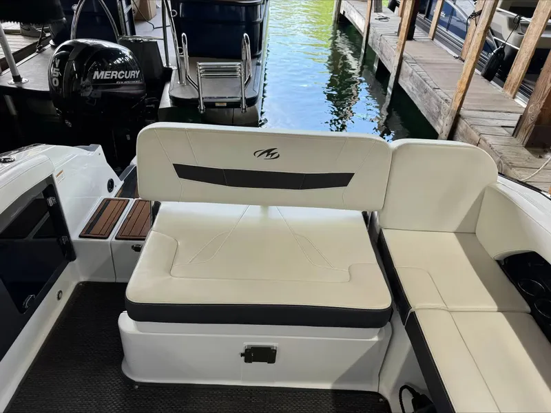 Slide: The Image of Interior of a 2016 Monterey 258SS Super Sport boat at the dock. - 8