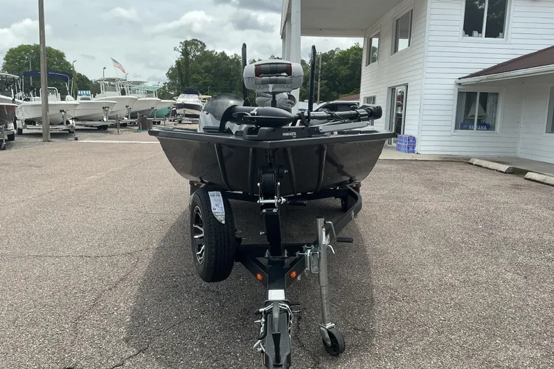 Slide: The Image of 2023 G3 Sportsman 1710 boat on trailer, parked outside dealership. - 3