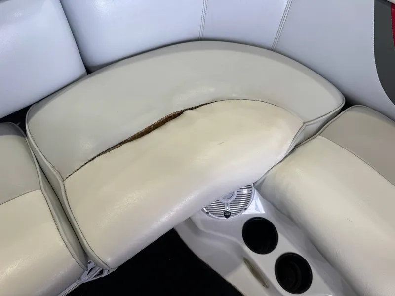 Slide: The Image of Damaged seat of a 2001 Tigé 21 V boat. - 17