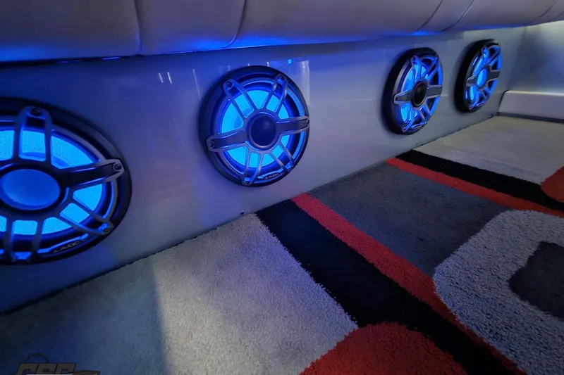 Slide: The Image of Blue LED-lit speakers in a 2012 Formula 353 FASTech boat interior. - 102