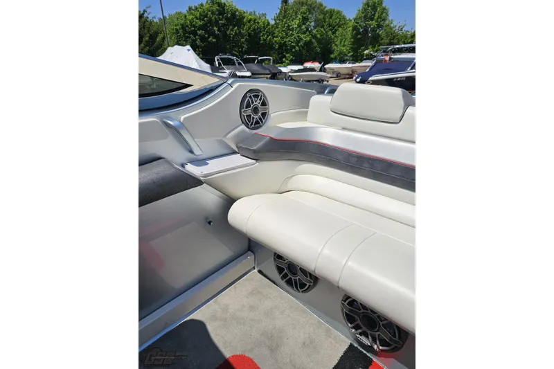 Slide: The Image of 2012 Formula 353 FASTech boat interior with sleek seating and modern speaker system. - 103