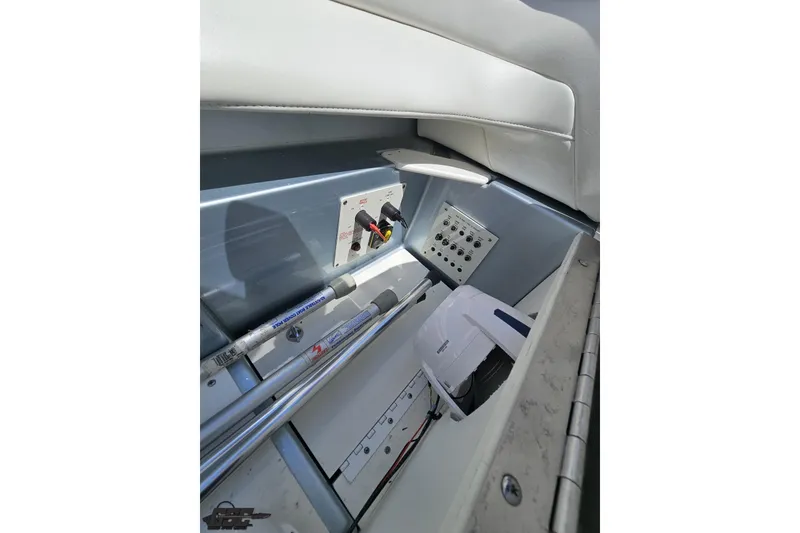 Slide: The Image of Interior view of a 2012 Formula 353 FASTech boat showing control panel and storage area. - 107