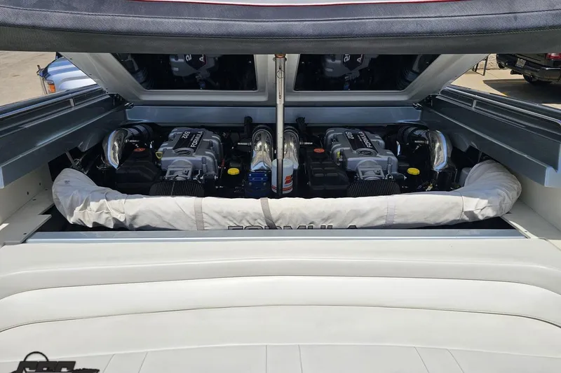 Slide: The Image of 2012 Formula 353 FASTech boat engine compartment with dual high-performance engines. - 111