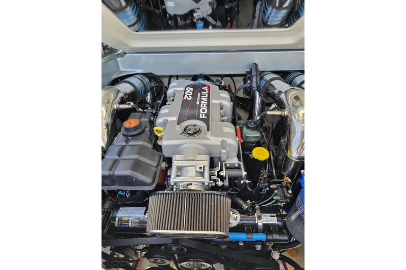 Slide: The Image of 2012 Formula 353 FASTech engine with detailed components and branding visible. - 115