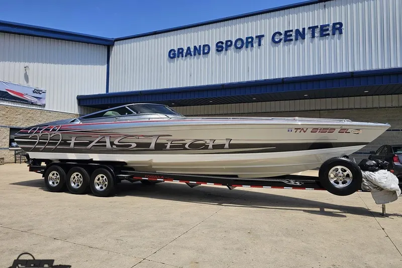 Slide: The Image of 2012 Formula 353 FASTech boat on trailer at Grand Sport Center. - 14