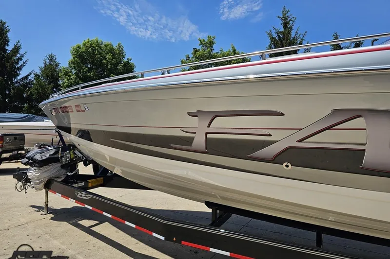 Slide: The Image of 2012 Formula 353 FASTech boat on trailer, sleek design under clear blue sky. - 21