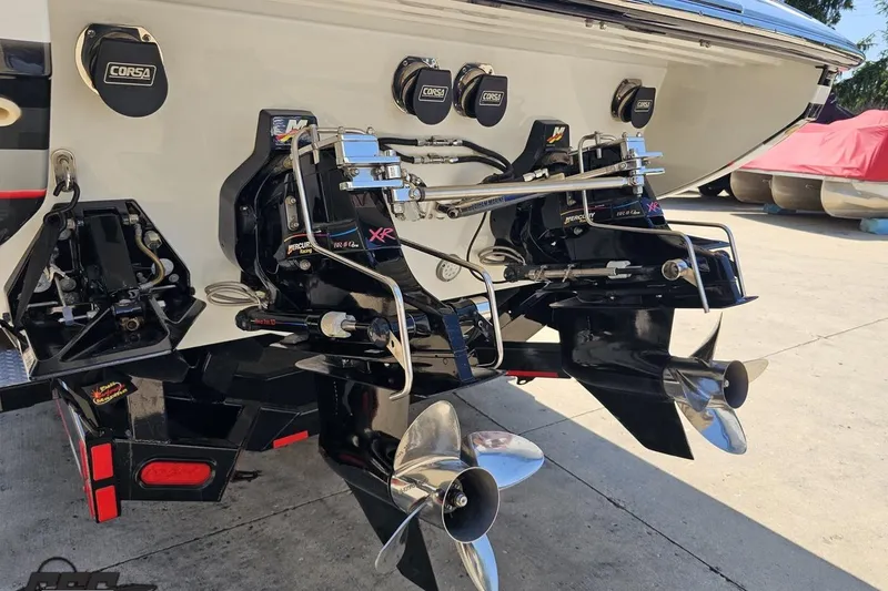 Slide: The Image of Rear view of a 2012 Formula 353 FASTech boat with dual propellers and Corsa exhaust. - 26