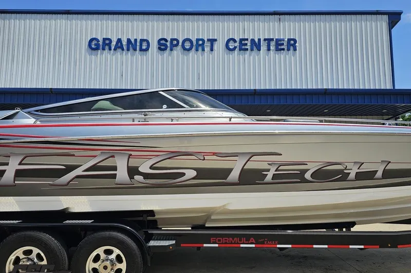Slide: The Image of 2012 Formula 353 FASTech boat on trailer at Grand Sport Center. - 3
