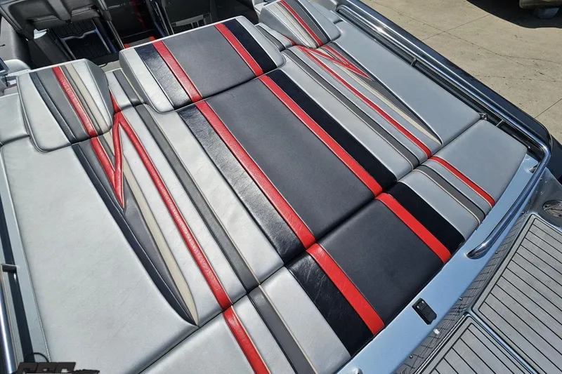 Slide: The Image of 2012 Formula 353 FASTech boat interior with red, black, and gray upholstery design. - 35