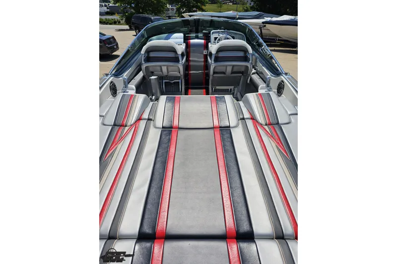 Slide: The Image of 2012 Formula 353 FASTech boat interior with sleek red and gray upholstery design. - 39