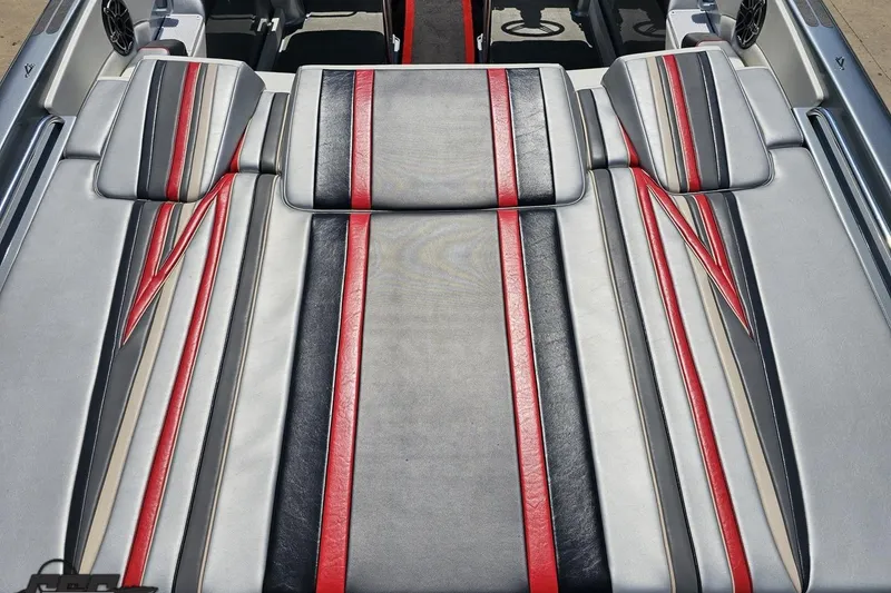 Slide: The Image of 2012 Formula 353 FASTech boat interior with red, black, and gray striped upholstery. - 41