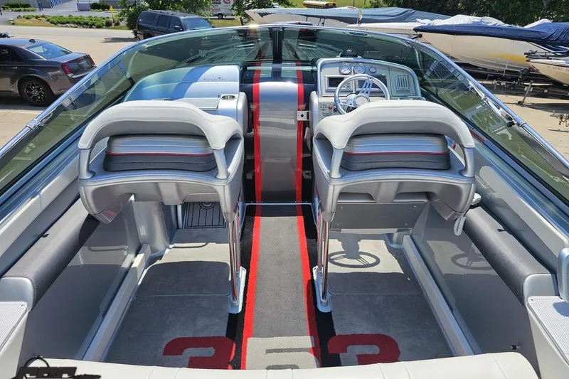 Slide: The Image of 2012 Formula 353 FASTech boat interior with sleek seating and modern dashboard. - 42