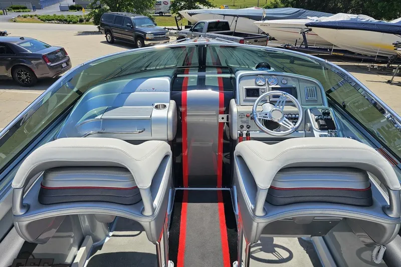 Slide: The Image of Interior view of a 2012 Formula 353 FASTech speedboat cockpit with sleek design. - 44