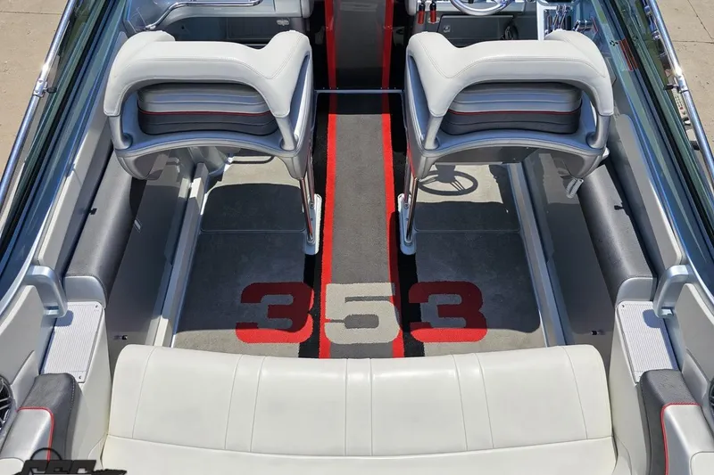 Slide: The Image of Interior of 2012 Formula 353 FASTech boat with white seating and "353" carpet design. - 46