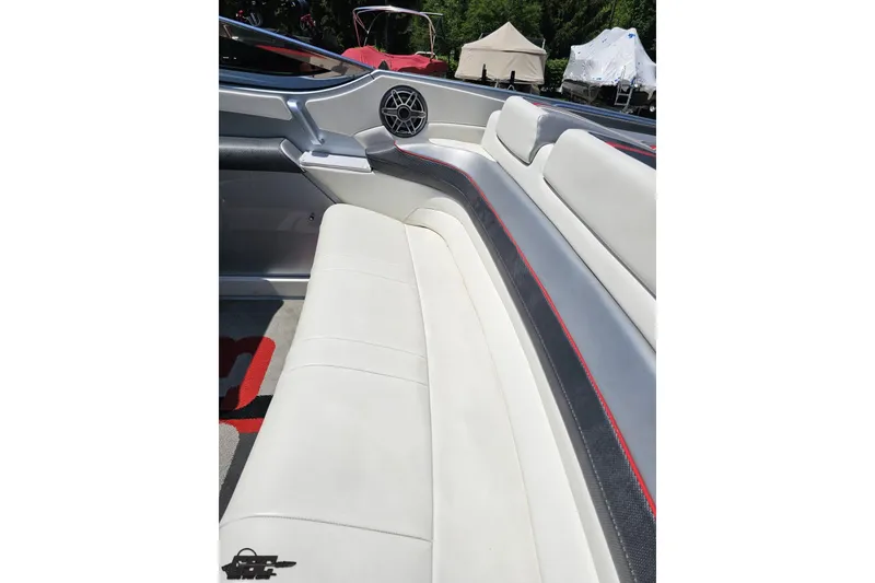 Slide: The Image of Interior of 2012 Formula 353 FASTech boat with white and gray seating, red accents. - 49