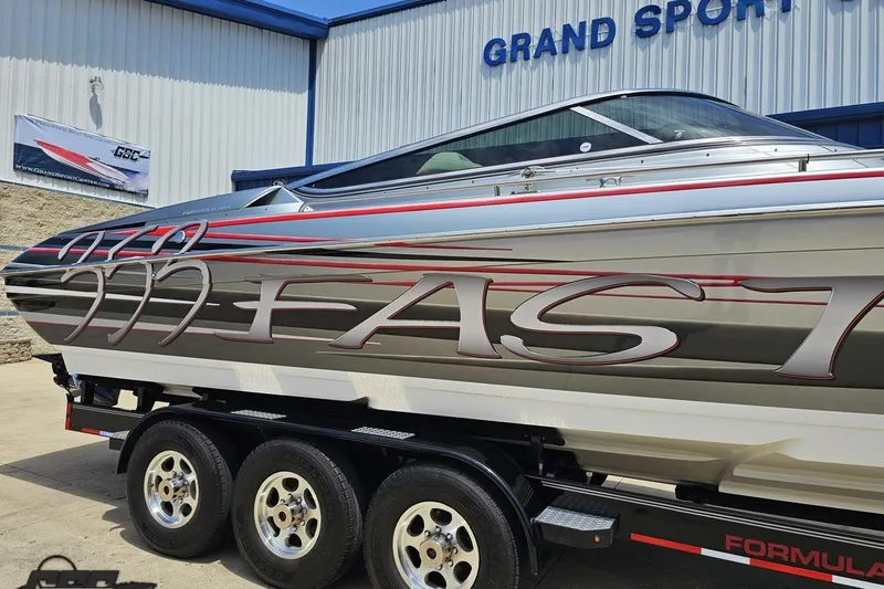Slide: The Image of 2012 Formula 353 FASTech boat on trailer at Grand Sport Center. - 5