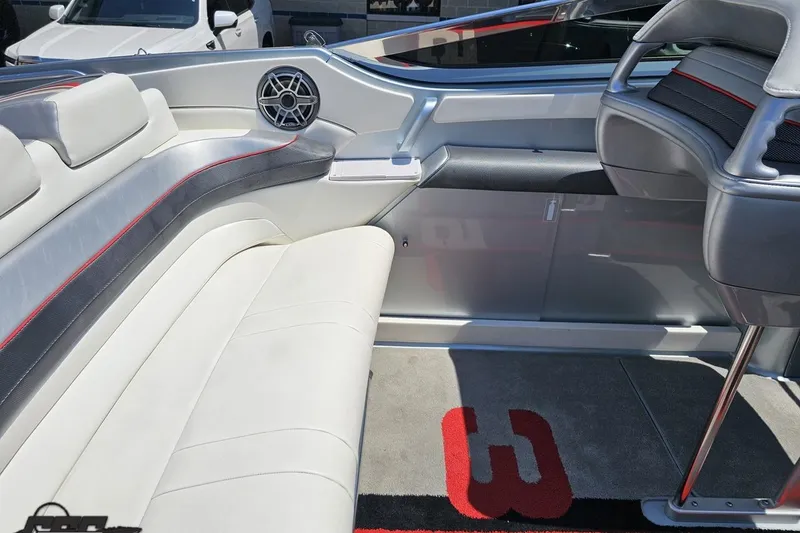 Slide: The Image of Interior of a 2012 Formula 353 FASTech boat, featuring sleek seating and modern design. - 52
