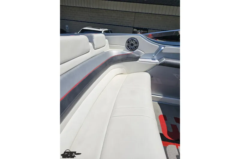 Slide: The Image of Luxurious interior of a 2012 Formula 353 FASTech boat with white seating and speaker detail. - 53