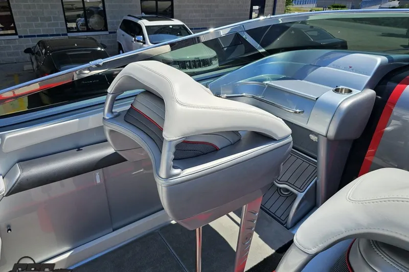 Slide: The Image of Interior of a 2012 Formula 353 FASTech boat, featuring sleek seating and modern dashboard design. - 54
