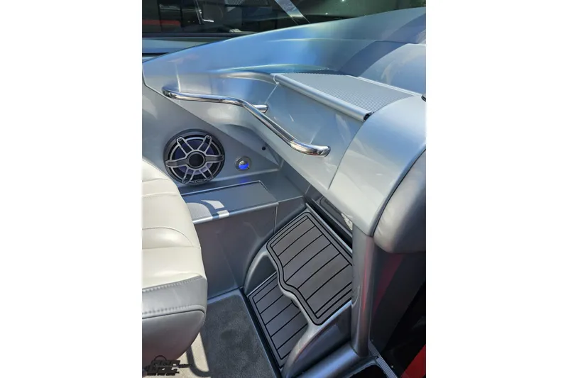 Slide: The Image of Interior of 2012 Formula 353 FASTech boat, featuring sleek design and speaker system. - 56