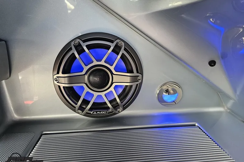 Slide: The Image of JL Audio speaker with blue LED lighting in a 2012 Formula 353 FASTech boat. - 58