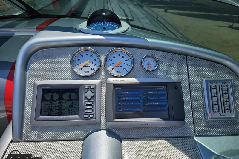Slide: The Image of Dashboard of a 2012 Formula 353 FASTech boat with gauges and navigation system. - 65